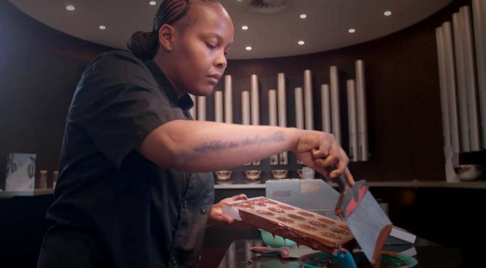 Chef Motheba works with her new chocolate, Kwena